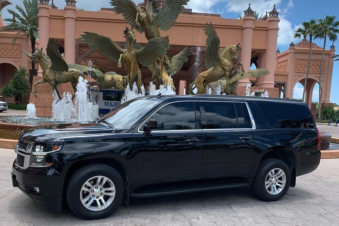 Airport-Atlantis Paradise Island Private Roundtrip Transportation - Meeting Your Driver Outside Customs