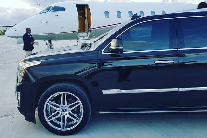 Luxury Escalade Cadillac Private Roundtrip Transportation - Key points at a glance
