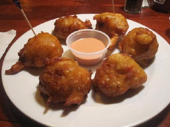 Nassau: Sip, Sample & See, Food & History Bus Tour - Fresh conch at the fish market