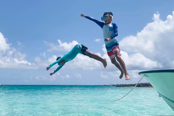 Rose Island Half-Day Snorkeling Cruise - Snorkeling reefs with coral and tropical fish